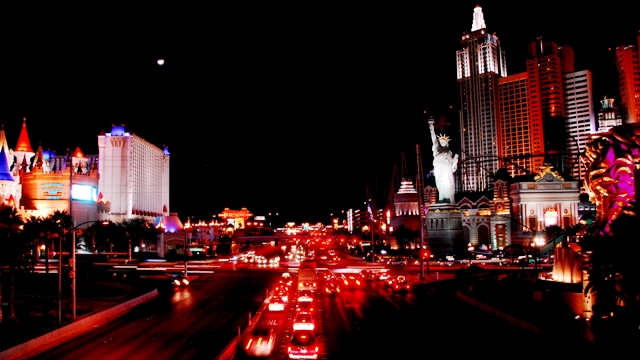 A Las Vegas view by night (L to R): Excalibur, New York New York, and MGM Grand's Golden Lion statue