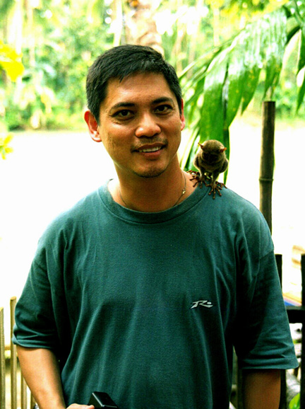 me and a Tarzier monkey, the smallest species of monkey in the world.